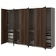 PAX wardrobe: dark brown wood, grey interior. Shelves, drawers, and hanging space. Modern, streamlined design.