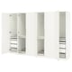 This image the white ikea PAX wardrobe with mirrored doors, offering a sleek design and ample storage space.