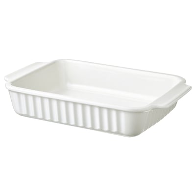 A white oblong baking dish with handles, made of stoneware, designed for various bakes.