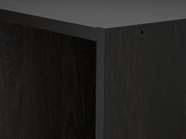 Black shelf unit, close-up of sturdy construction, one shelf shown.