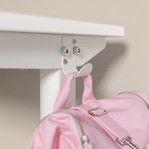 A white RELATERA desk hook holding a pink backpack.