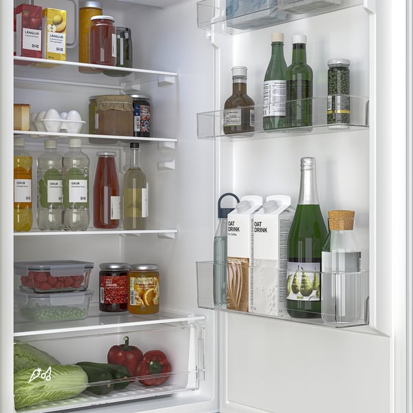 Organised fridge with adjustable shelves, clear sections for food items, bottles, jars & produce. Led lighting illuminates all compartments.