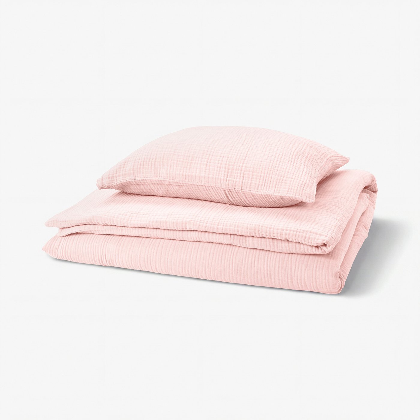 SCHERSMIN pink cotton duvet set, neatly folded, showcasing soft, wavy texture for comfort.