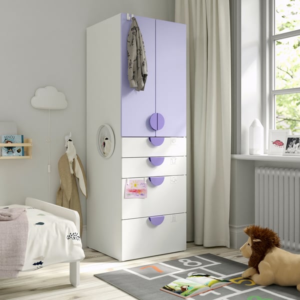 Room with SMÅSTAD wardrobe, teddy bear, jacket, bookshelf.