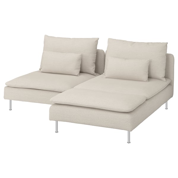 A beige modular sofa, SÖDERHAMN, with a chaise and two large pillows. The sofa has a modern, low-profile design with chrome legs.