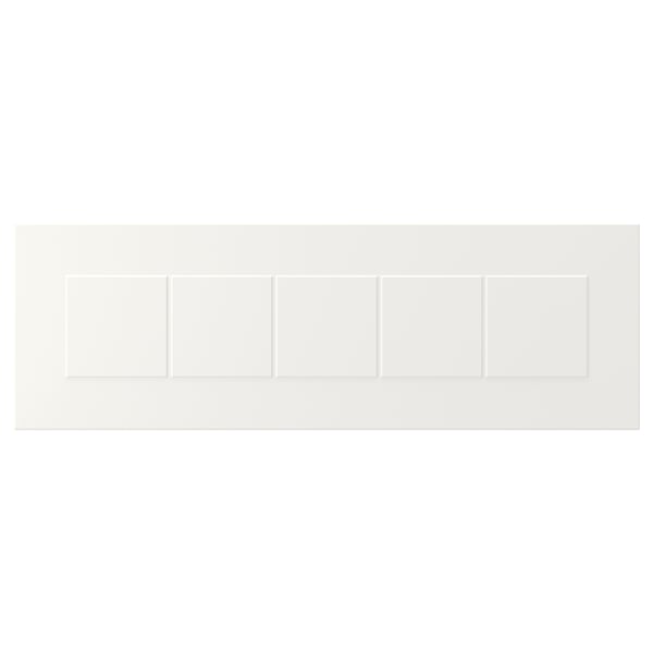 STENSUND white cabinets with framed, grooved panels.