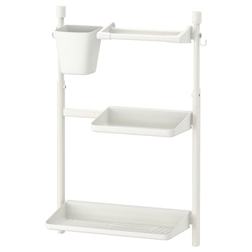 A white SUNNERSTA kitchen rack with multiple shelves and a hanging basket, made of polypropylene plastic, designed for efficient storage and draining.
