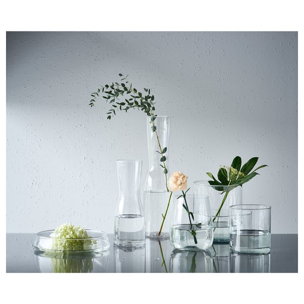 TIDVATTEN clear glass vase set with assorted shapes for flowers. Shows minimalist design.