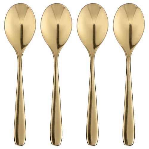 Four elegant golden spoons arranged neatly, reflecting light, with sleek handles and rounded bowls, perfect for dessert.