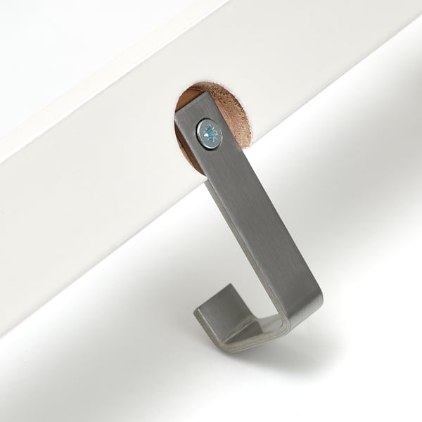A stainless steel hook mounted on a solid wooden base with screws, displaying quality materials and sturdy construction.