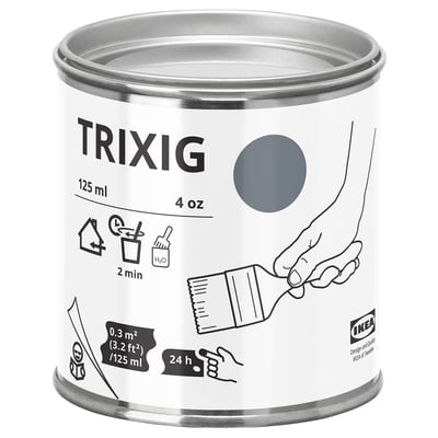 A can of IKEA TRIXIG grey paint, 125 ml, circular shape, white label with black text and icons, suitable for small furniture projects.