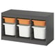 TROFAST grey storage unit, featuring orange and white bins, ideal for organising kids toys. Sturdy design with plastic bins in compartments.