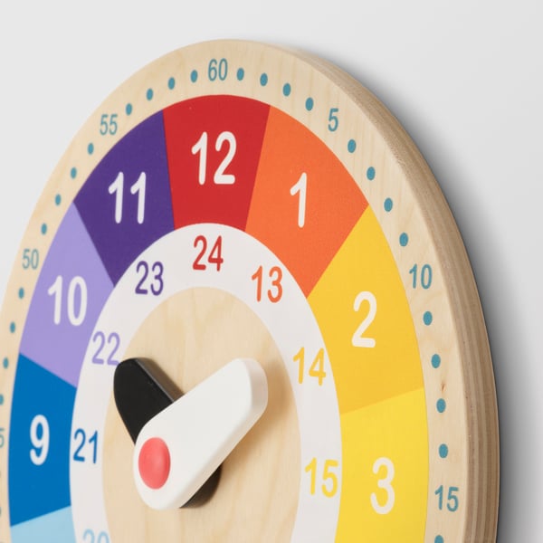 Colourful wooden clock, vibrant segments, large numbers, easy-move hands, educational design.