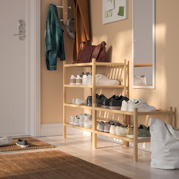Shoe rack named VASSKÄR made of bamboo, holds various footwear. Fits narrow spaces, stacks up to two units high.