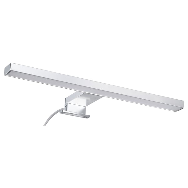 A VÅTHULT wall lamp, a sleek, silver, rectangular, modern design with led lighting ideal for bathroom use.