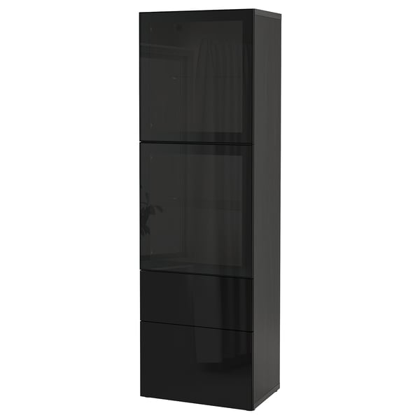 Kaasaegne must IKEA BESTÅ kapp klaasuste ja sahtlitega hoiustamiseks ja väljapanekuks.