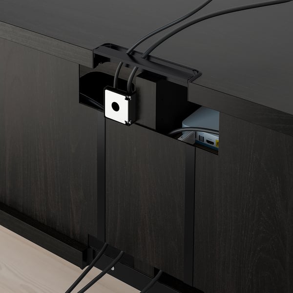 Must teleripink kaabeljuhtimisega. Pehmelt sulguv sahtel, reguleeritavad jooksud. Kaablid on peidetud seadme taha.