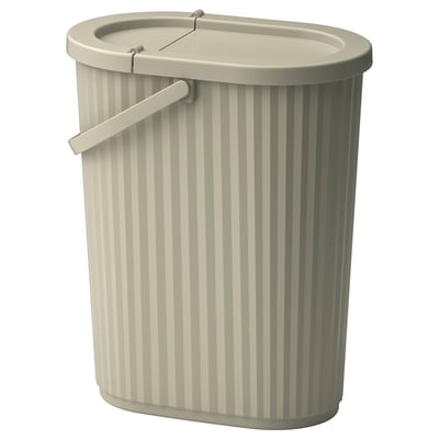 Sellel pildil on valkjas triibuline DAMMÄNGU prügikast, millel on kaas, käepide ja klanitud ovaalne kuju tõhusaks jäätmete sorteerimiseks.
