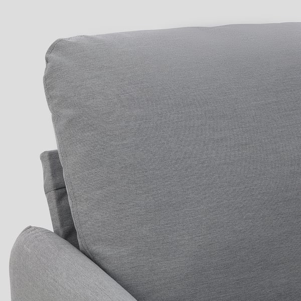Close-up of ANGERSBY sofas cushioned armrest, grey fabric texture visible, showcasing quality and comfort.