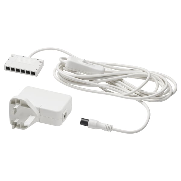 White ikea ANSLUTA power cord set for controlling up to six lights with one switch.