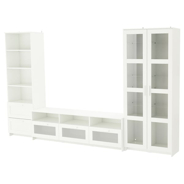 A white BRIMNES tv storage unit set. It adjustable shelves, drawers, and glass doors for organised storage.