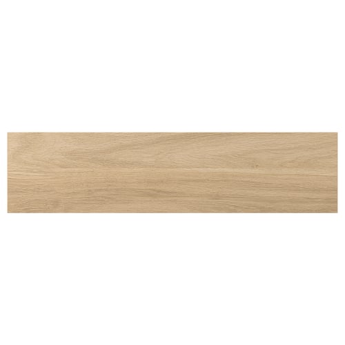 A wooden panel in light oak colour, rectangular, with smooth foil surface.