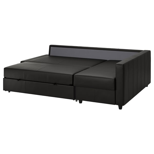 Black FRIHETEN convertible sofa-bed with storage, sleek modern design, leather-like coat fabric.