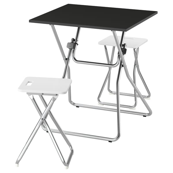 A GUNDE folding table set. It includes a black table and two white stools. The metal frames are silver for durability and easy storage.