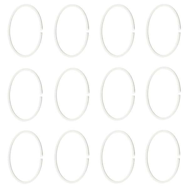 Twelve white oval plastic hoops displayed in rows.