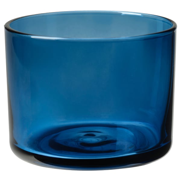Blue glass candle holder, cylindrical shape, smooth finish, no patterns.