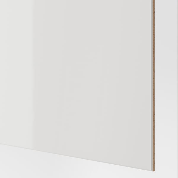 White high-glossy sliding door panel, sleek and modern design, part of HOKKSUND collection.