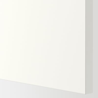 Close-up of smooth, white JÄRNBODA cabinet door. Shows sleek design and flawless finish.