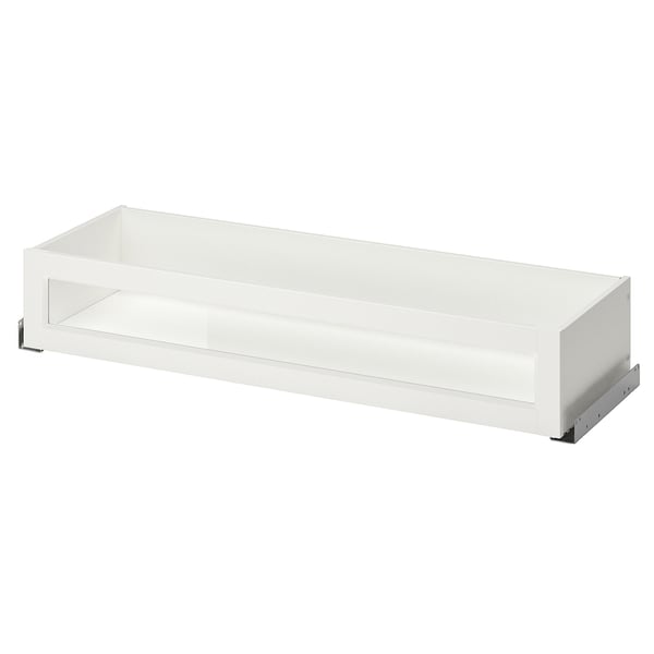 White KOMPLEMENT drawer with glass front, sleek and modern design.