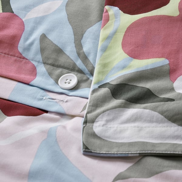 Abstract floral print duvet cover with silvery button closure.