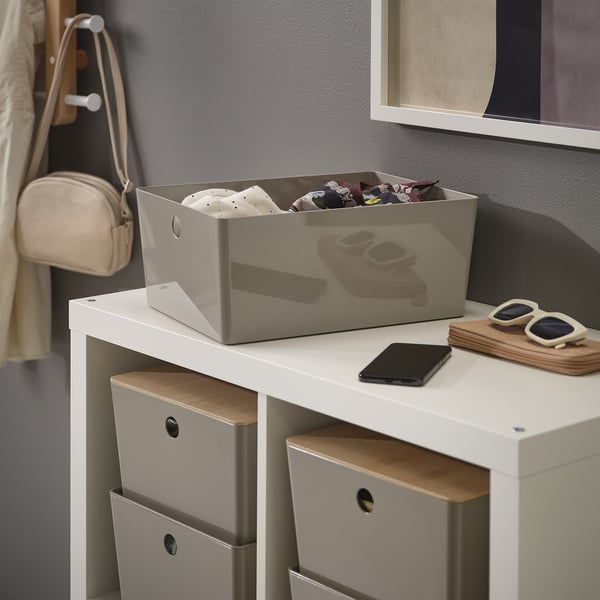 Shelf storage box with various small items, organising easily.