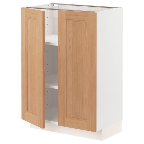 A METOD kitchen cabinet with light oak doors and a white base.