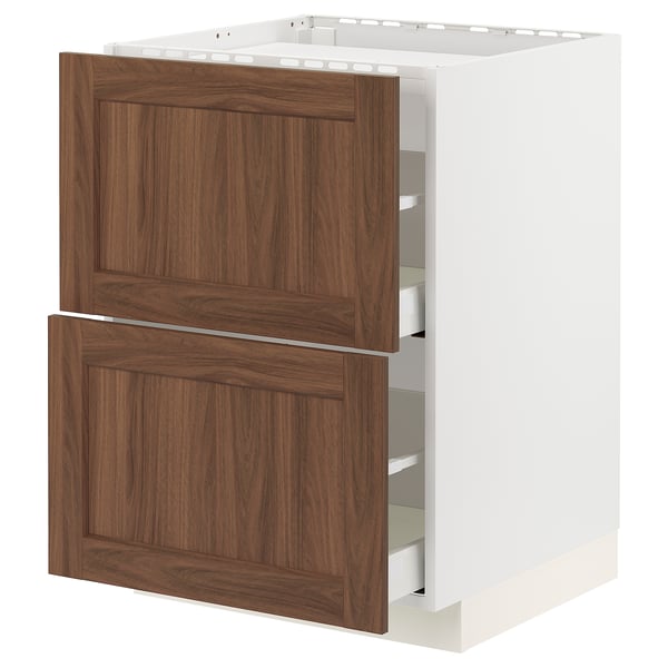 White METOD kitchen cabinet with walnut pull-out drawers.