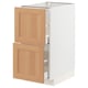 Modern kitchen unit: METOD. White cabinet, oak drawers. Sturdy, self-closing drawers.