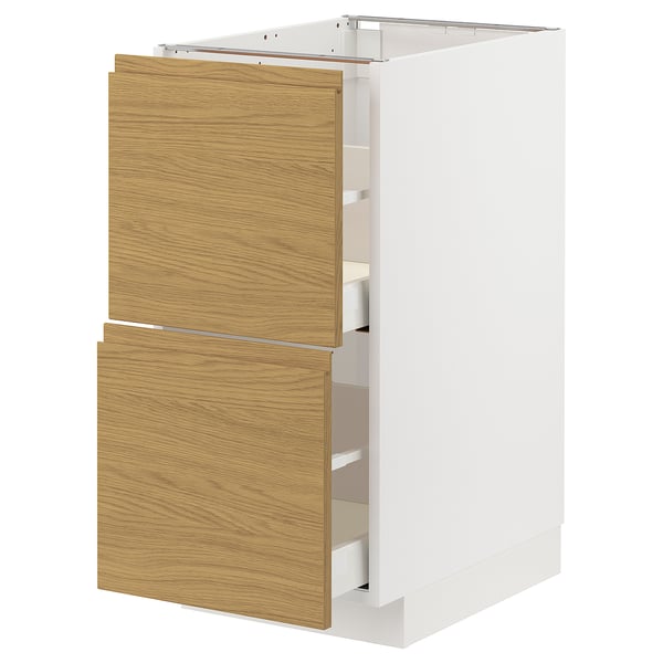 White and oak kitchen cabinet with two drawers and shelves.