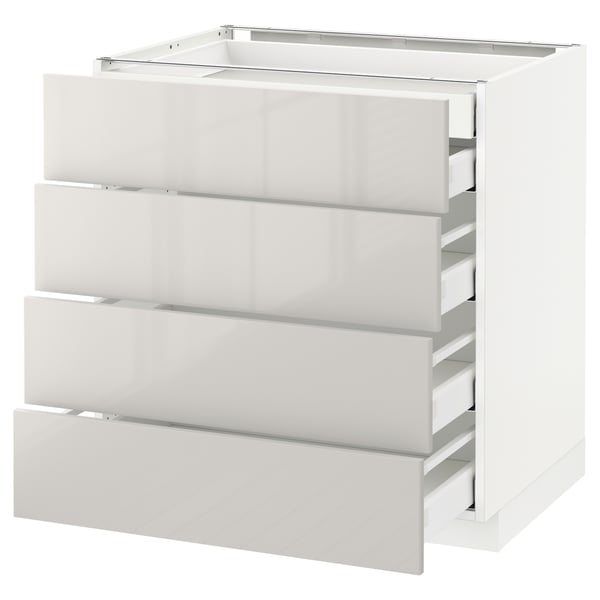 White METOD kitchen unit, glossy finish with four drawers.