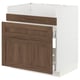 This image shows an ikea METOD kitchen cabinet with walnut-effect drawers and a white base, featuring sleek, modern design with a classic wooden look.