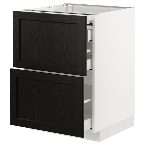 White and black wooden kitchen cabinet with pull-out drawers.