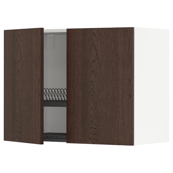 Dark wooden cabinet with open door revealing shelves. Crafted from oak veneer and particleboard, its designed for kitchen storage.