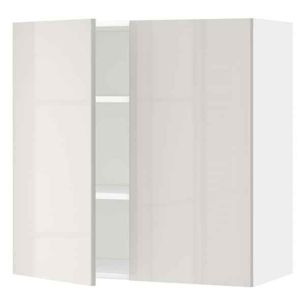 White METOD cabinet: sleek modern design, high gloss, snap-on hinges, adjustable shelves.