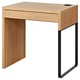 MICKE light brown desk, sleek design, black steel legs, cable hole, clean lines, functional study desk.
