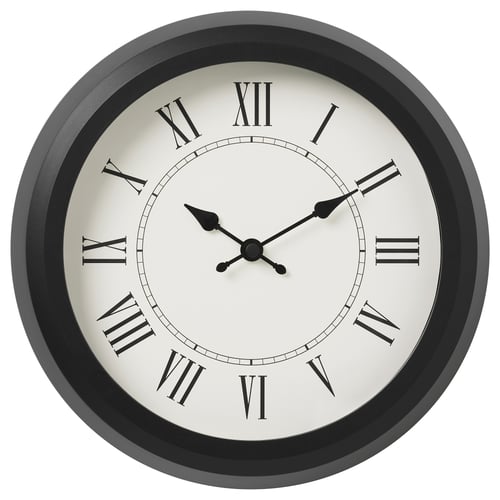 A NUFFRA clock, white with black roman numerals and hands, circular shape, silent quartz movement, housed in a black frame with glass front.