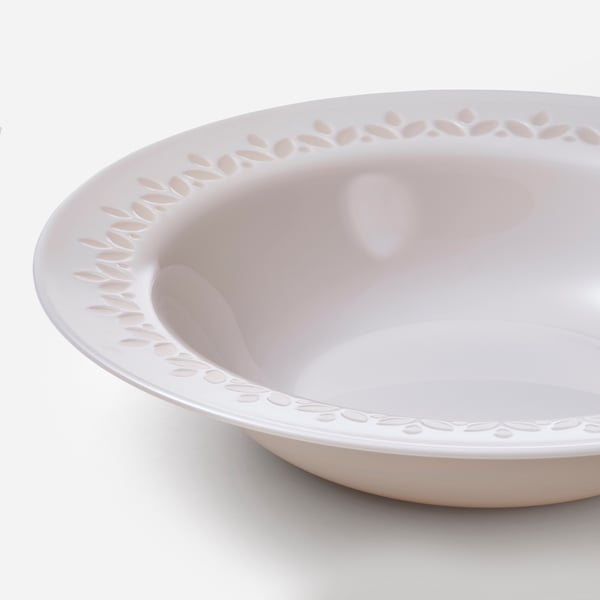 White bowl, embossed floral rim, elegant craftsmanship.