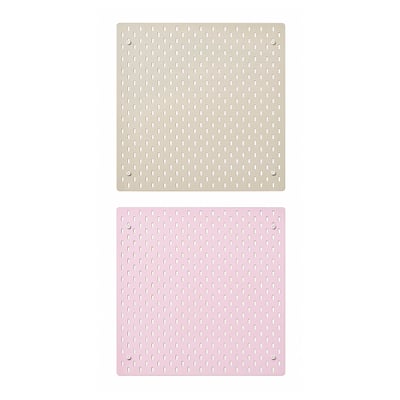 Two square pegboards shown, one light beige, one pastel pink, with evenly spaced holes around the edges.