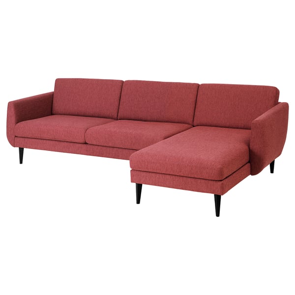 Red retro-style sofa with sectional chaise, cone legs, foam cushions for comfort.