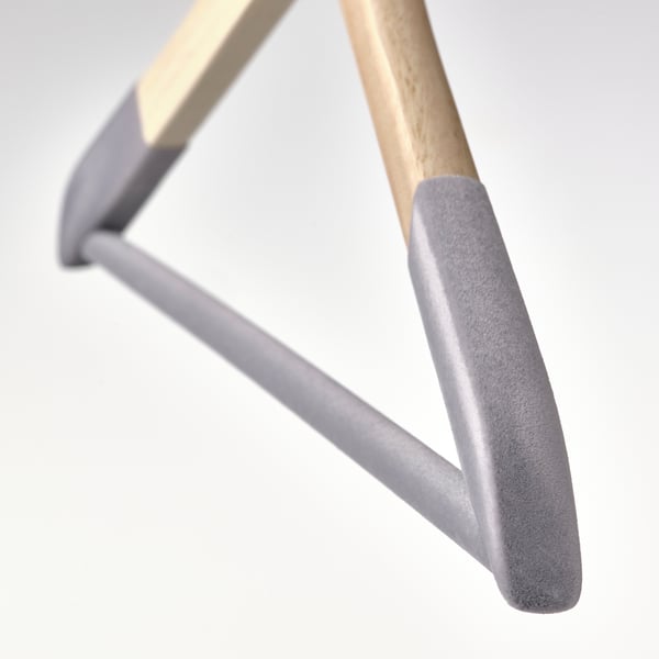 Wooden hanger with grey flocked surface, sturdy and stylish.